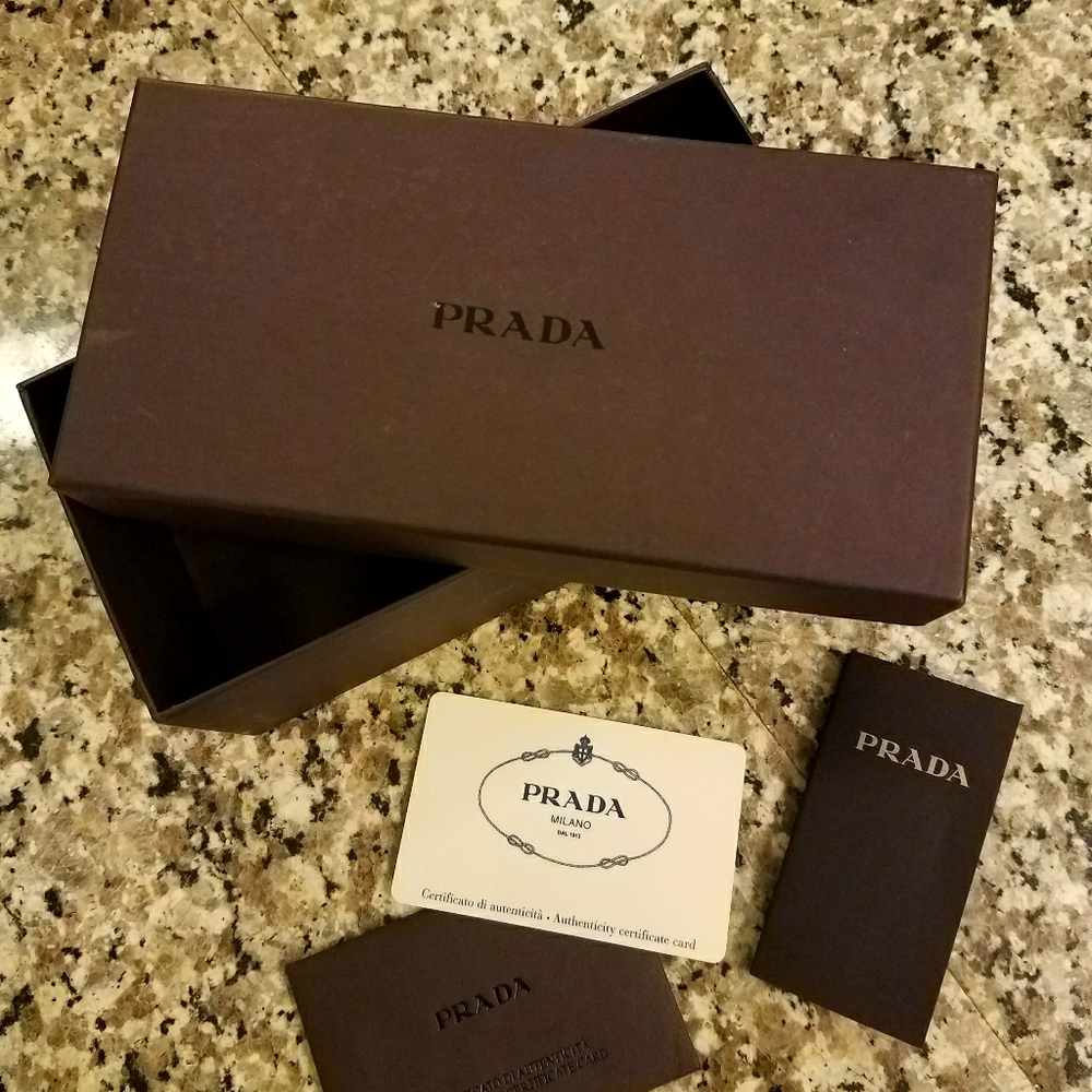 Prada shield unisex sunglasses.